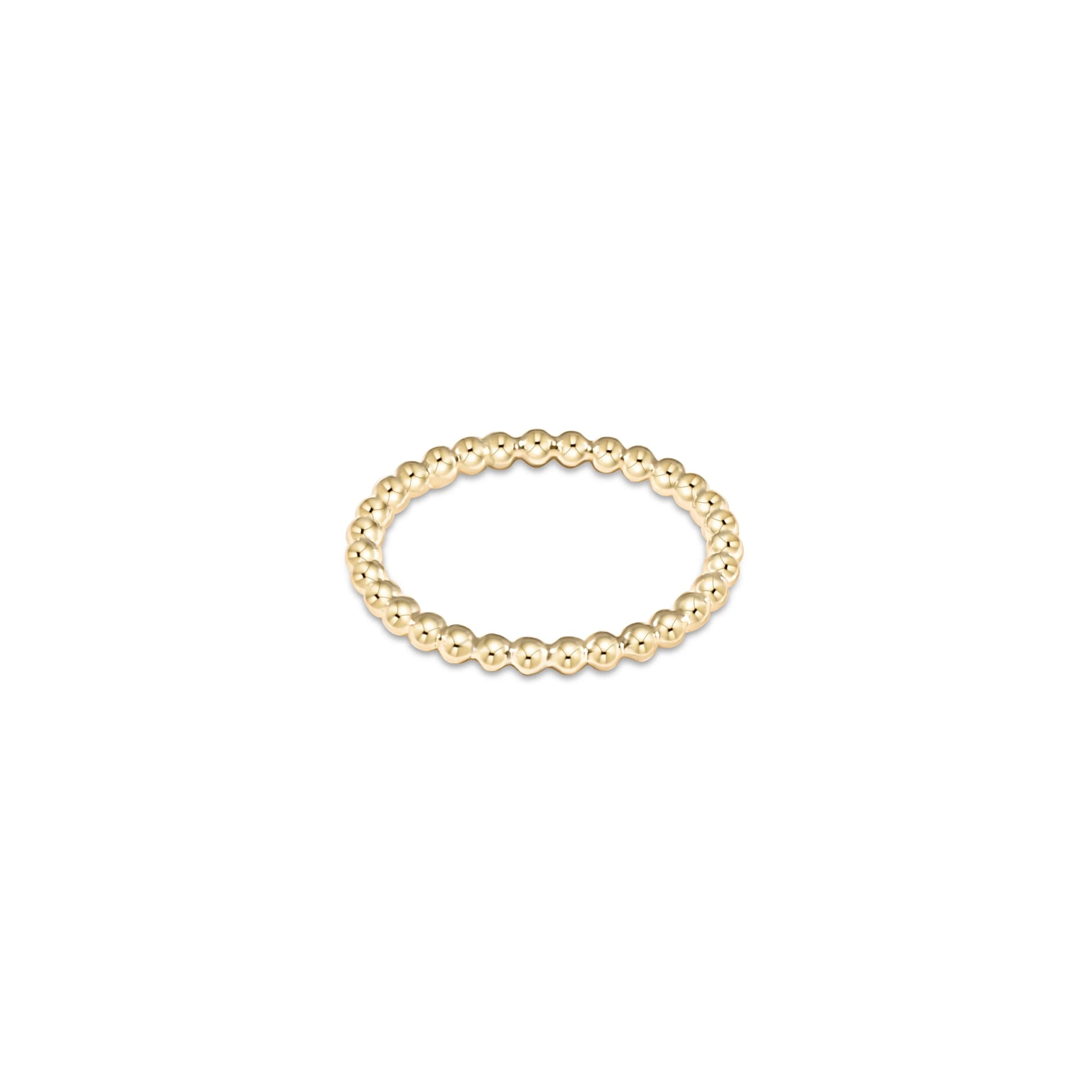 A gold-olated beaded ring with a 2mm band width by enewton, displayed against a white background.