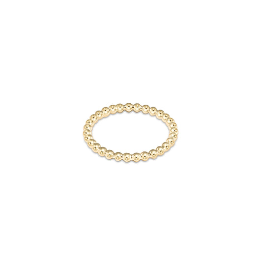 A gold-olated beaded ring with a 2mm band width by enewton, displayed against a white background.