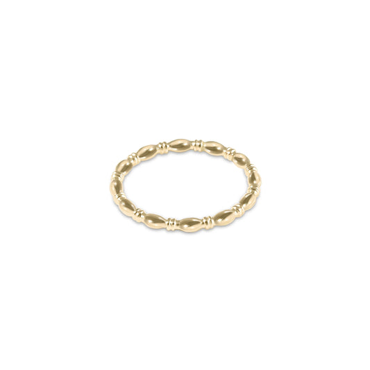 A gold-plated harmony ring by enewton with an elongated 2mm beaded design.