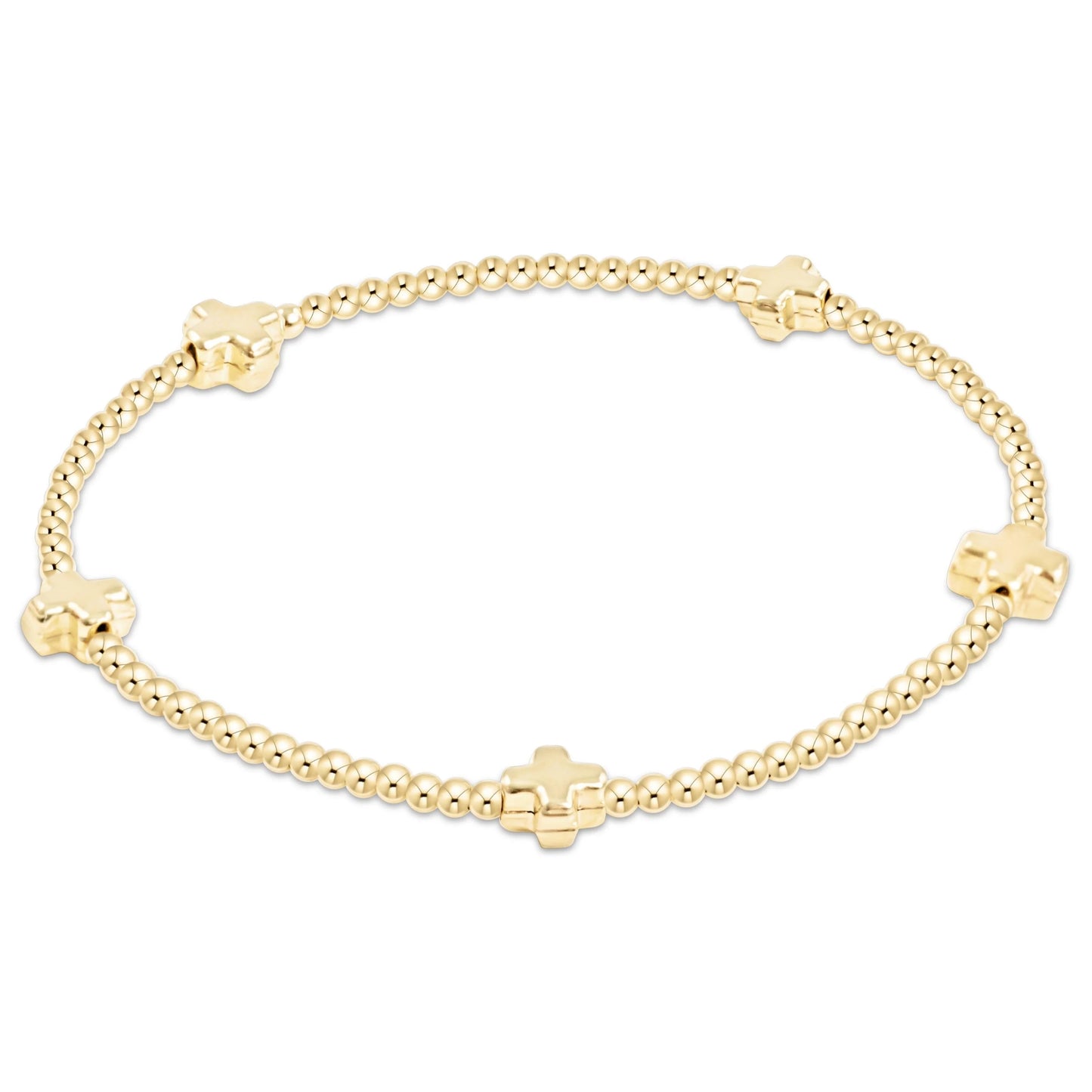 enewton signature cross bracelet with 2mm gold beads and gold cross design available at the little exchange