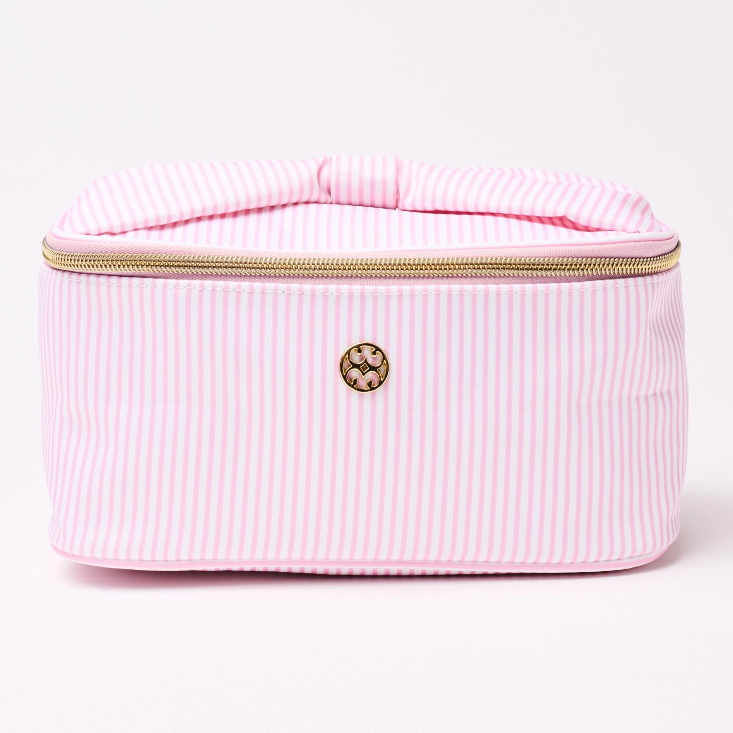 Pink striped make-up bag with gold zipper and a bow handle