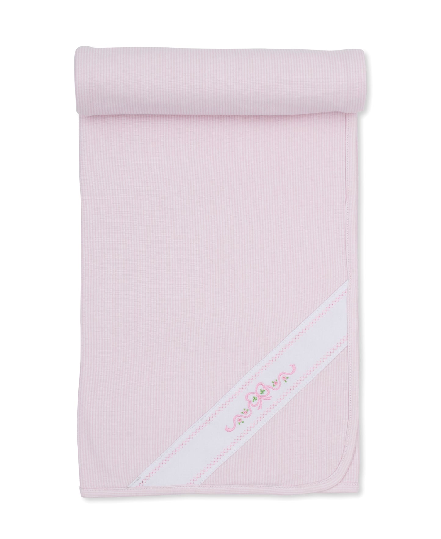 kissy kissy classic treasures light pink ribbed baby blanket with a white diagonal stripe and pink embroidered script on the corner, shown rolled at the top on a white background.