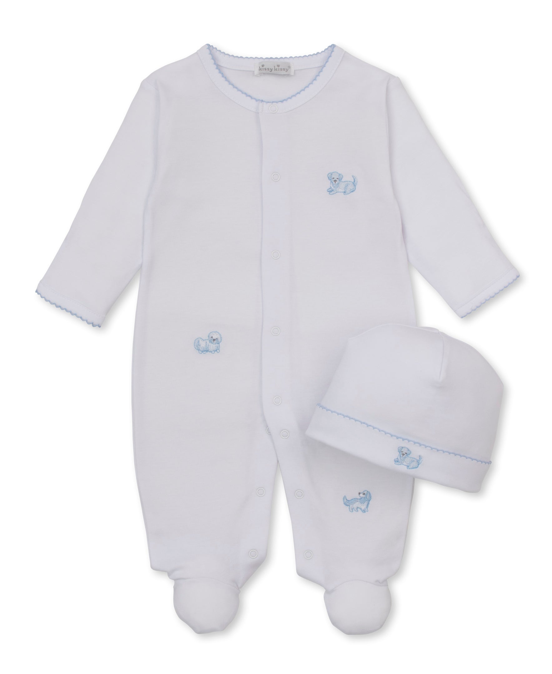 A white long-sleeve baby footie and hat set with light blue scalloped trim and a small blue embroidered puppy