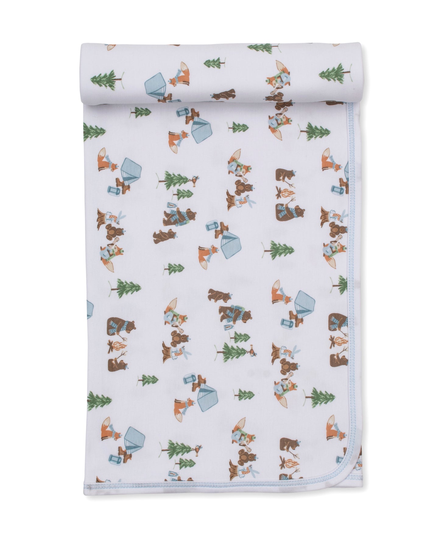 A rolled white baby blanket or swaddle with a repeating woodland pattern of brown bears, orange foxes, green pine trees, and blue-gray tents, shown on a clean white background.