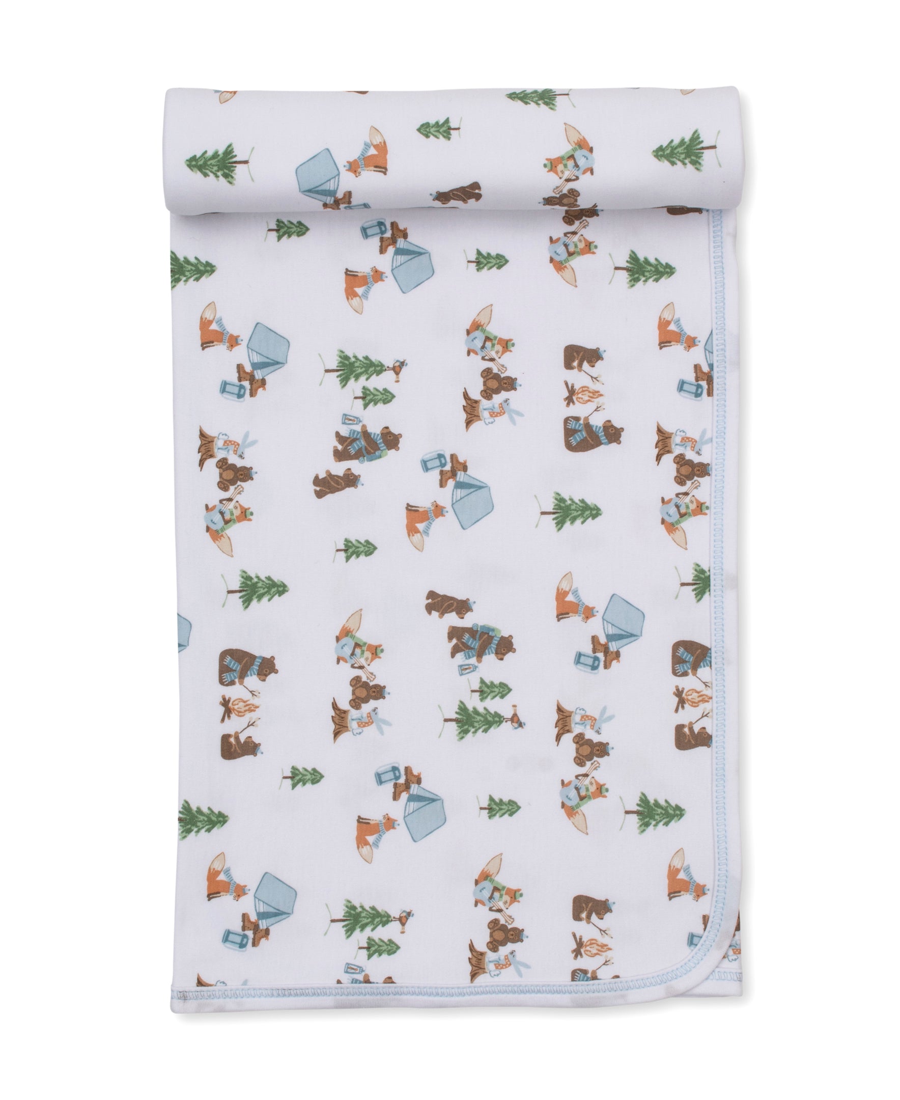 A rolled white baby blanket or swaddle with a repeating woodland pattern of brown bears, orange foxes, green pine trees, and blue-gray tents, shown on a clean white background.