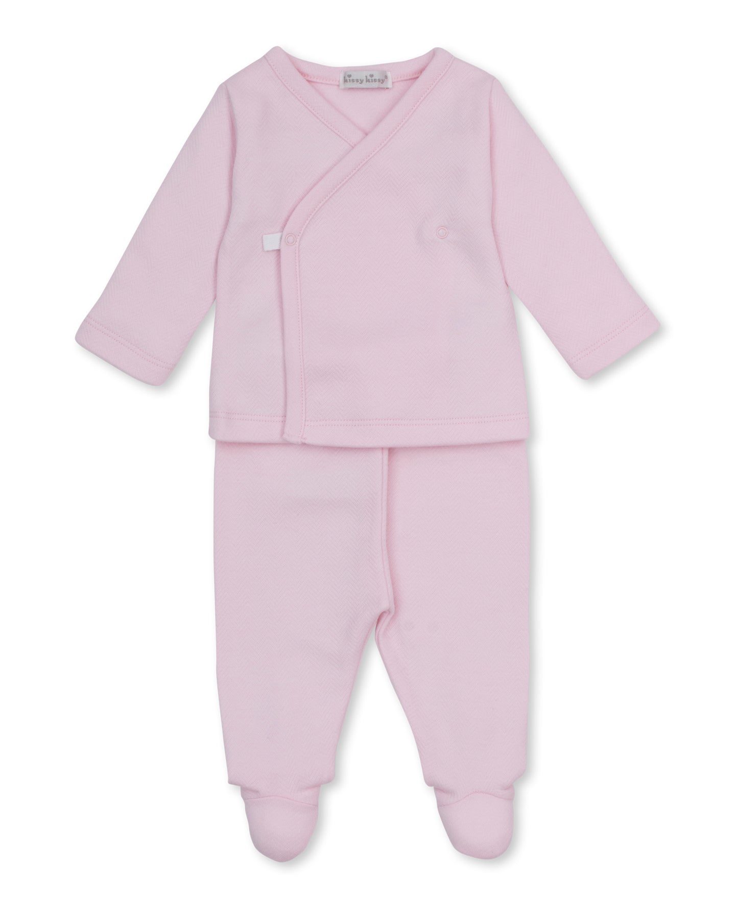 Pink baby outfit with a wrap top and pants in a jacquard fabric