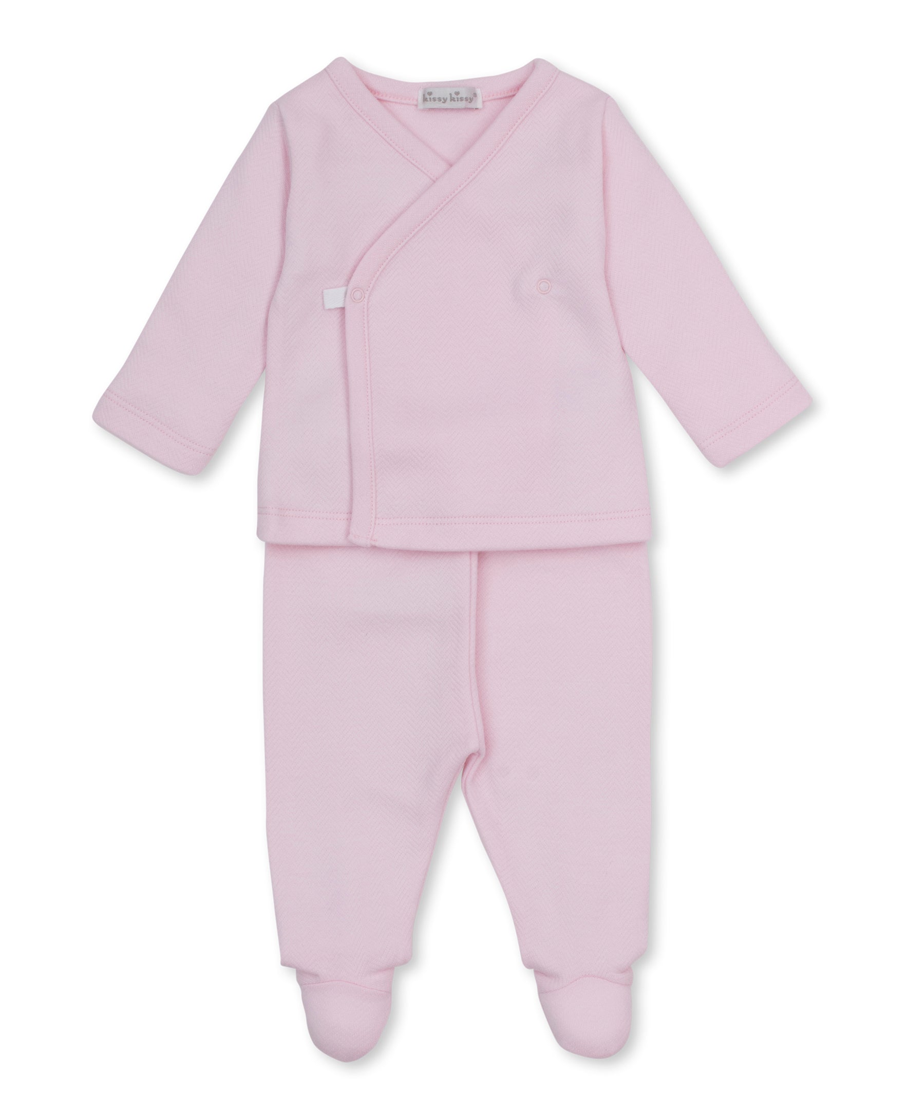 Pink baby outfit with a wrap top and pants in a jacquard fabric