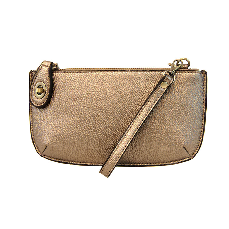 A metallic bronze mini crossbody wristlet clutch bag with a shiny surface, featuring a turn lock and a strap.