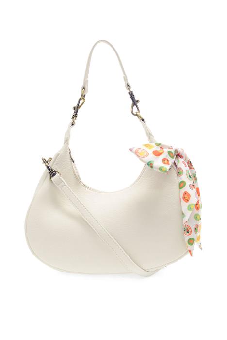 white crescent shaped hobo bag with an attached scarf