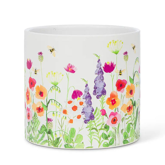 garden planter with bright flowers and bees