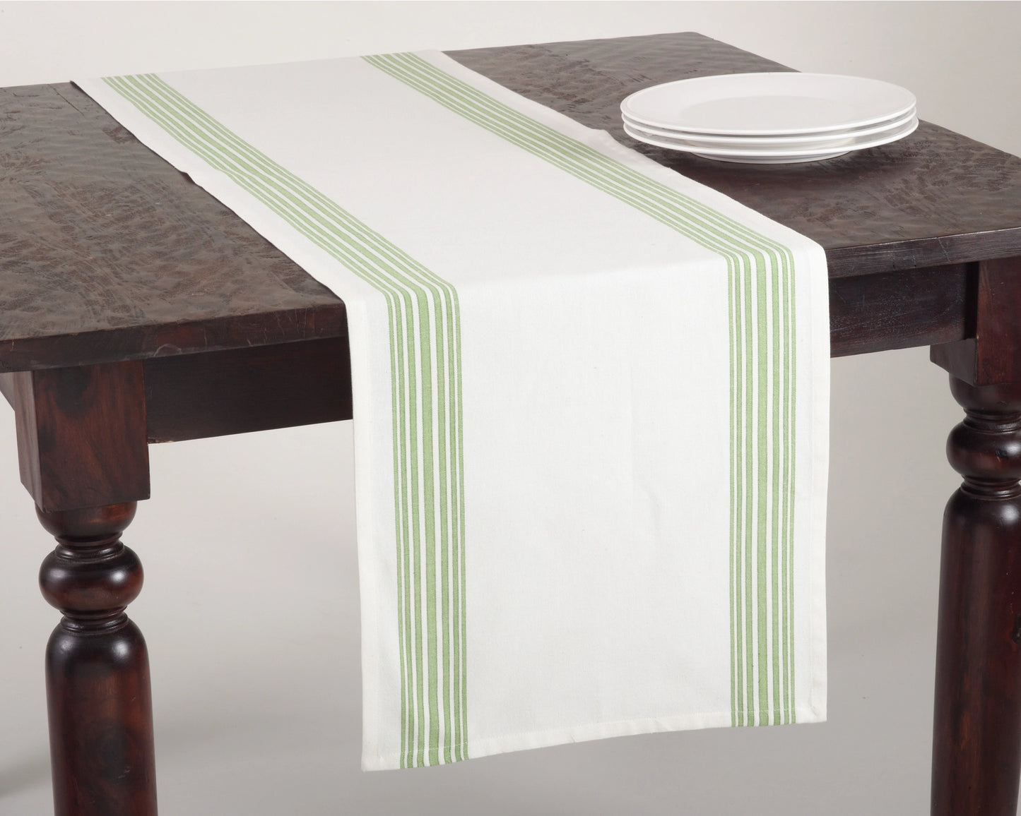 white table runner with lime green thin stripes down each side