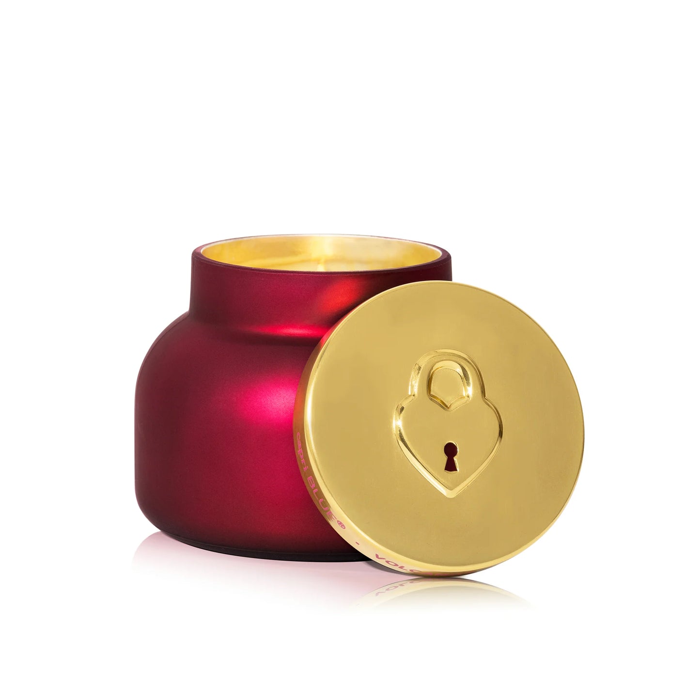 Red candle jar with a gold lid featuring a lock design on a white background