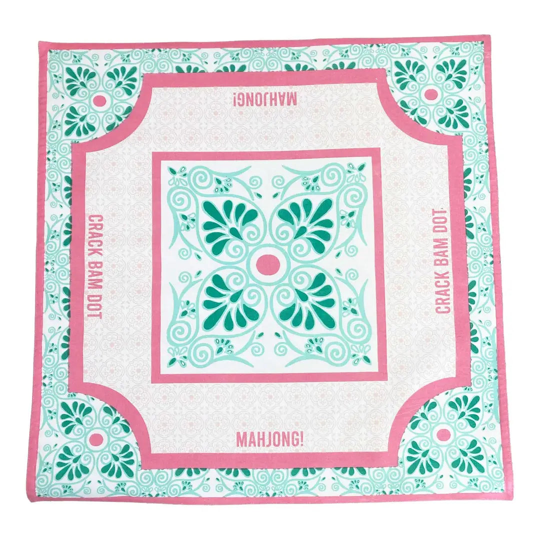 square mahjong mat in pink, teal and white with a tile design