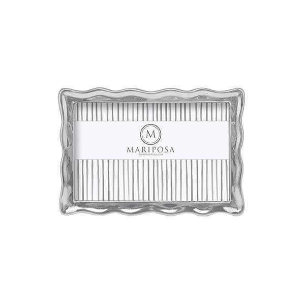 A silver-colored wavy 4x6 picture frame with the Mariposa logo on it.