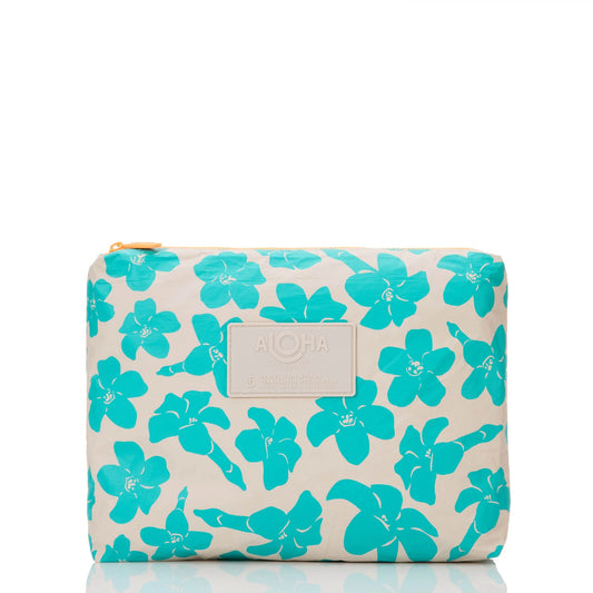 Cosmetic bag with turquoise floral pattern on a beige background