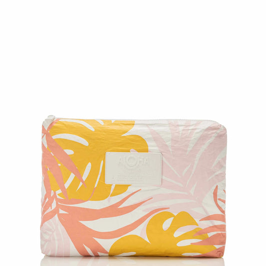 cosmetic/travel organizer from the Aloha Collection with a tropical print in yellow and coral on a white background