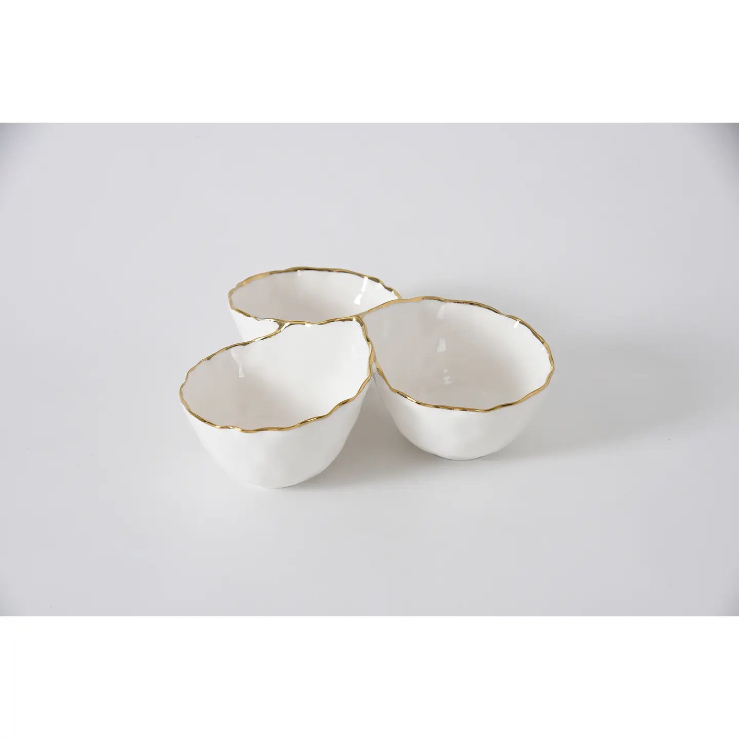 white ceramic 3 section server with a gold rim by Pampa Bay