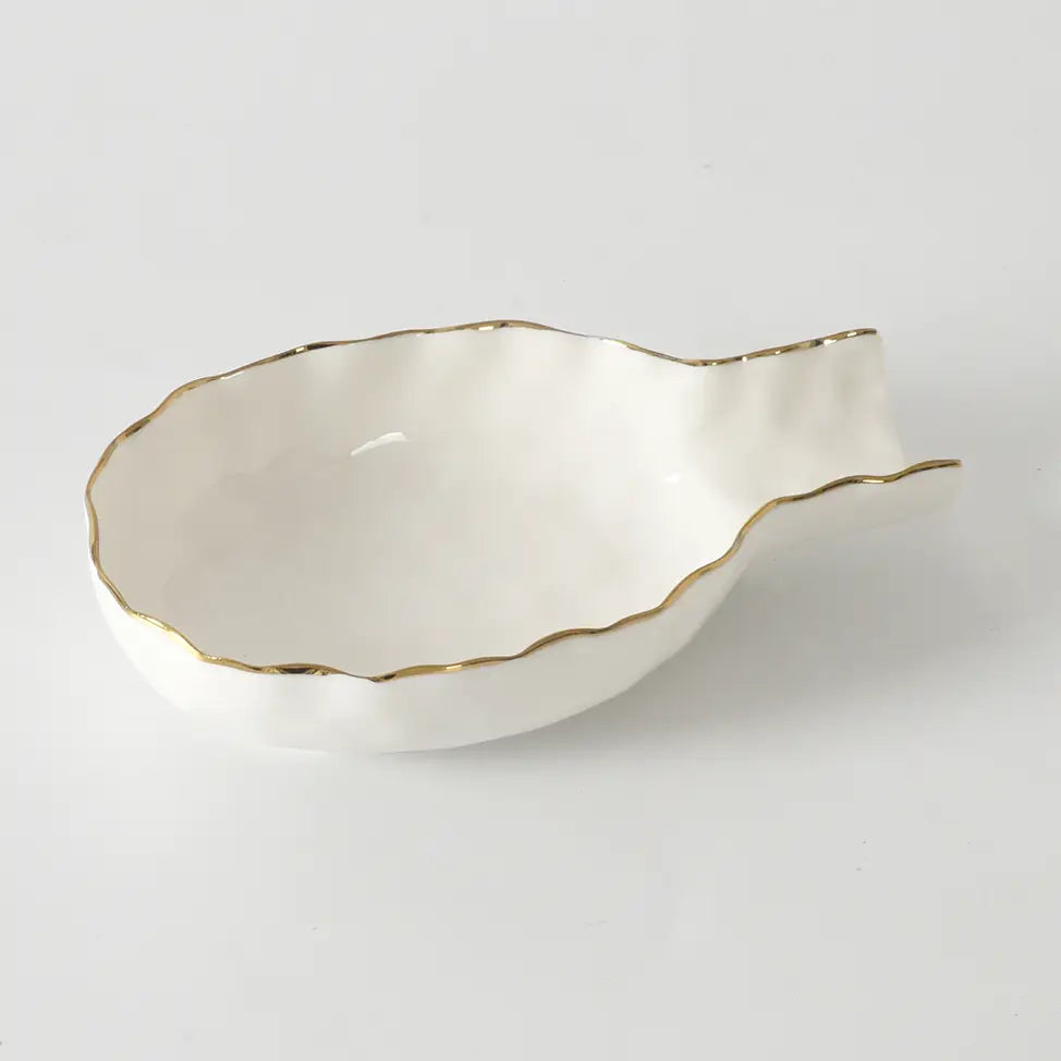 white ceramic spoon rest with a gold rim by Pampa Bay