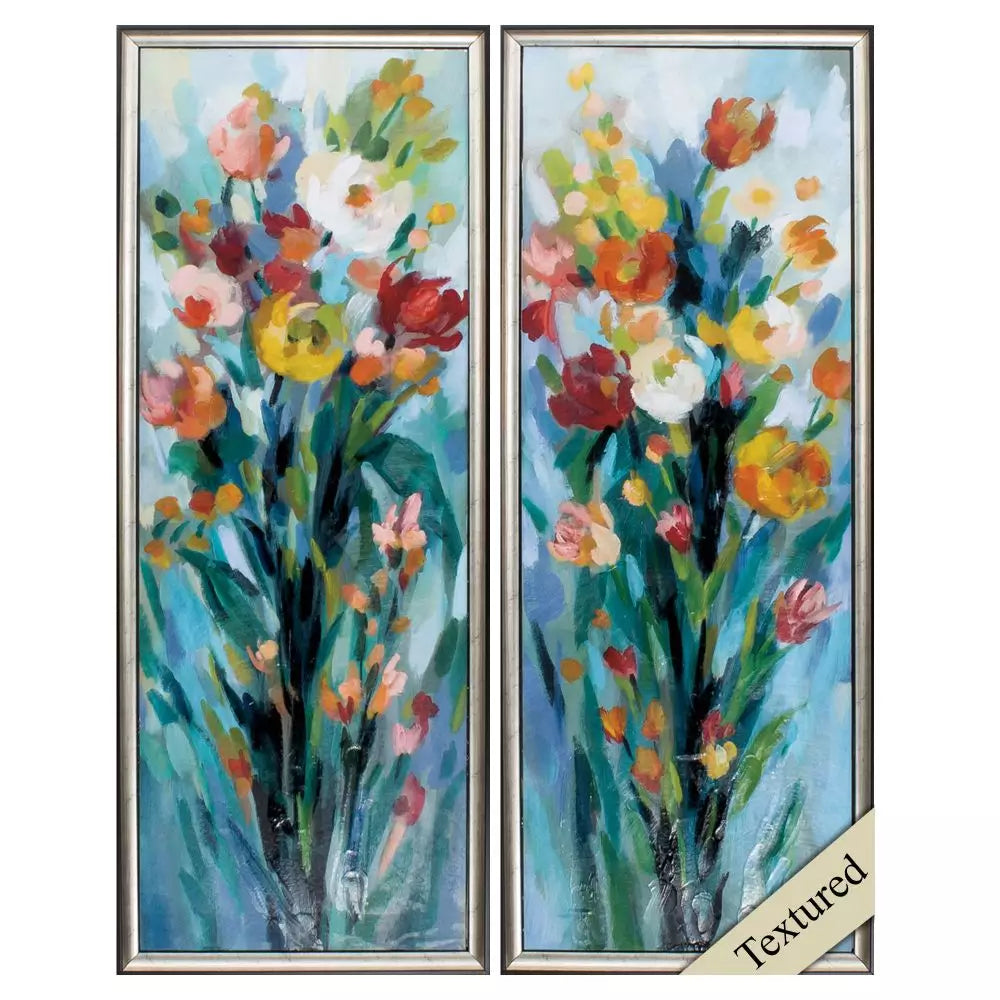Two tall framed paintings of colorful floral arrangements by paragon
