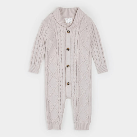 child's beige sweater knit one piece bodysuit with a shawl collar and brown buttons
