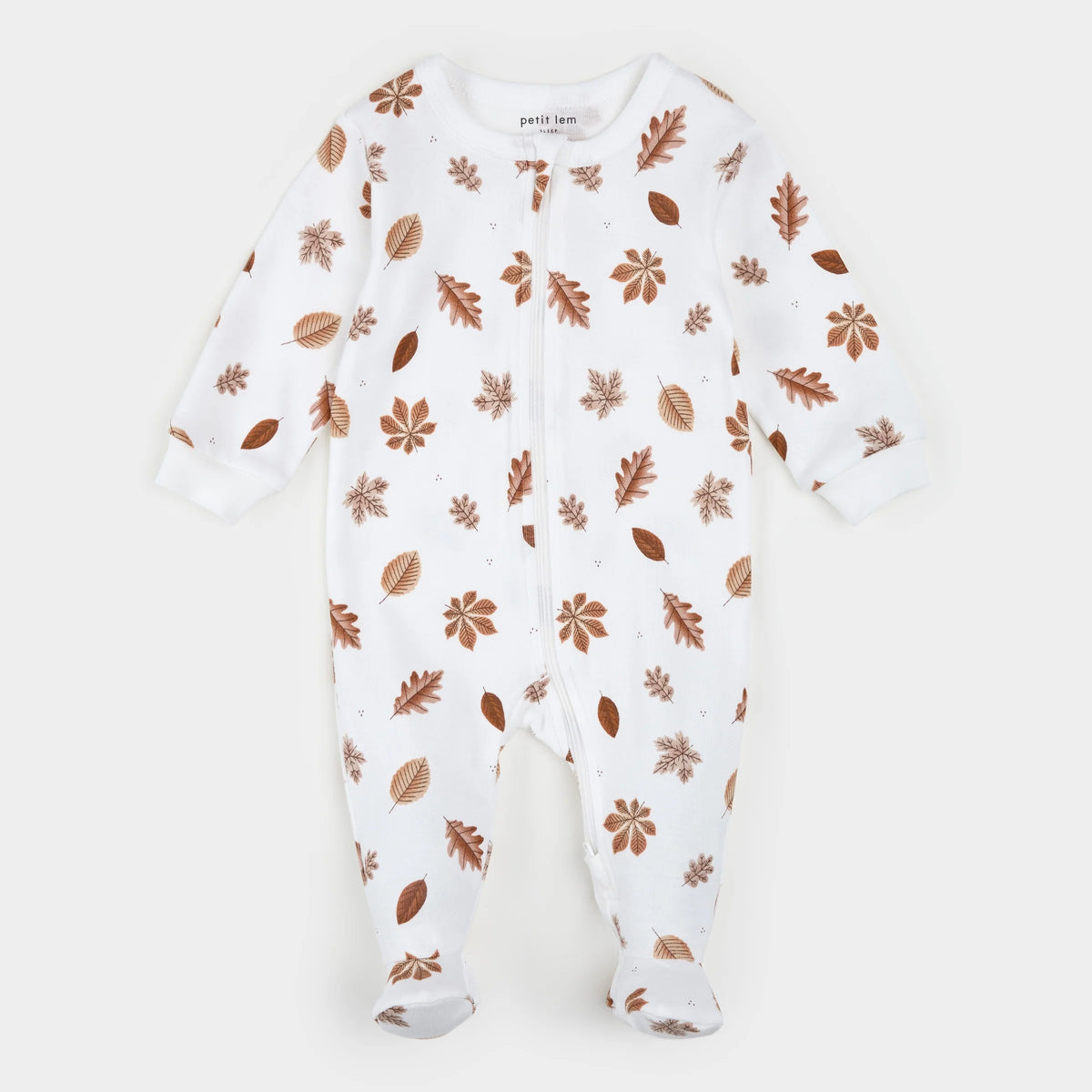 A white baby footed sleeper with a brown and tan autumn leaf pattern, featuring a front zipper and long sleeves and legs.