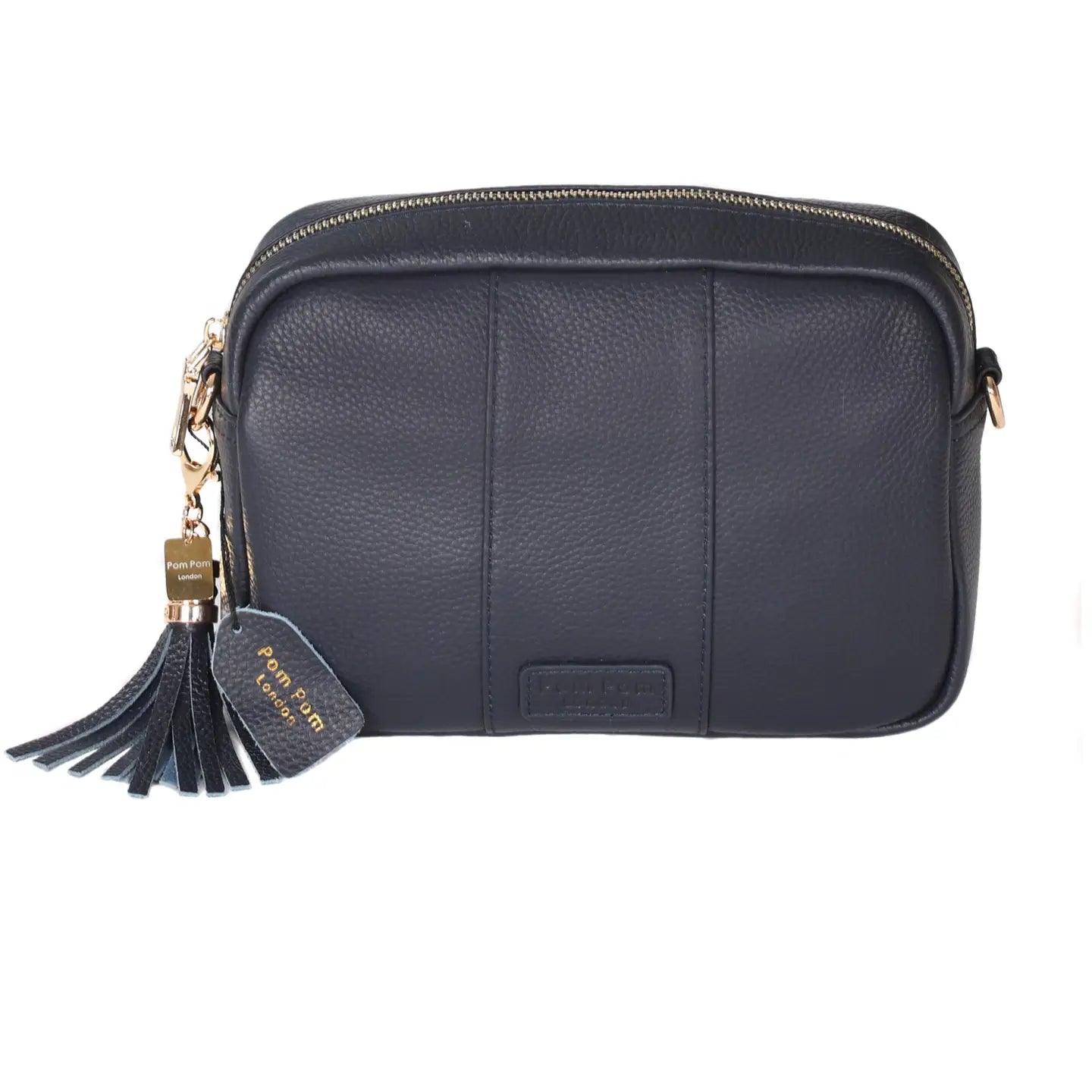pom pom london city bag in navy with a tassel
