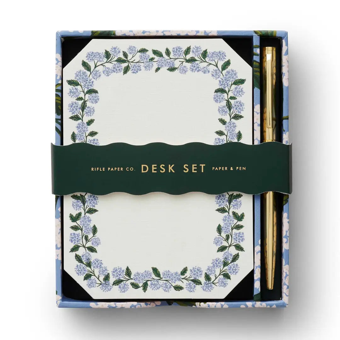 Desk set with floral design paper and pen in a box, featuring Ripple Paper Co branding.