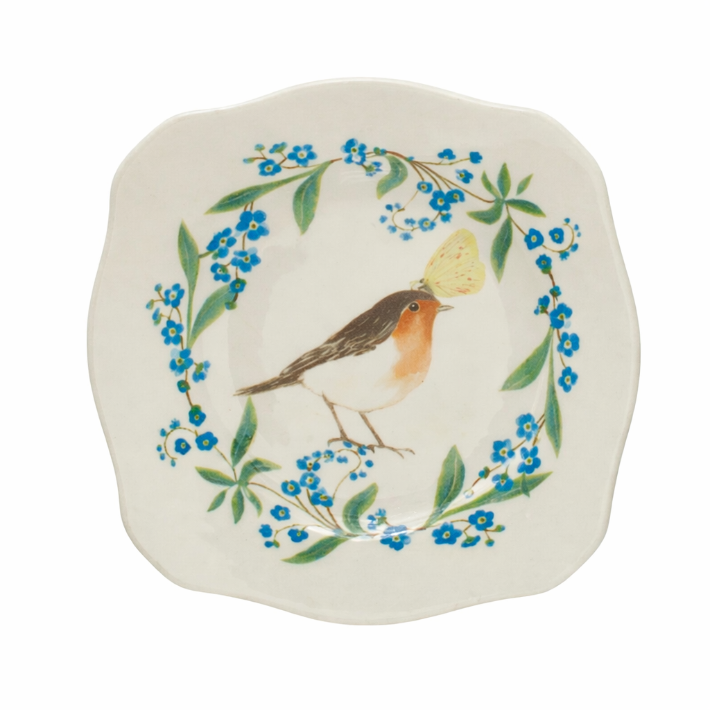 stoneware plate featuring a robin in a ring of flowers