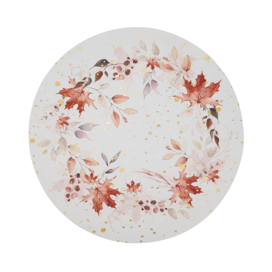 A round placemat with a watercolor autumn wreath design featuring red, orange, and brown leaves, soft pink berries, and scattered gold speckles on a light background.