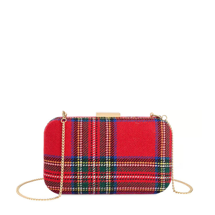 A red tartan plaid clutch bag with a gold-tone chain strap and a gold metal clasp, shown against a plain white background.