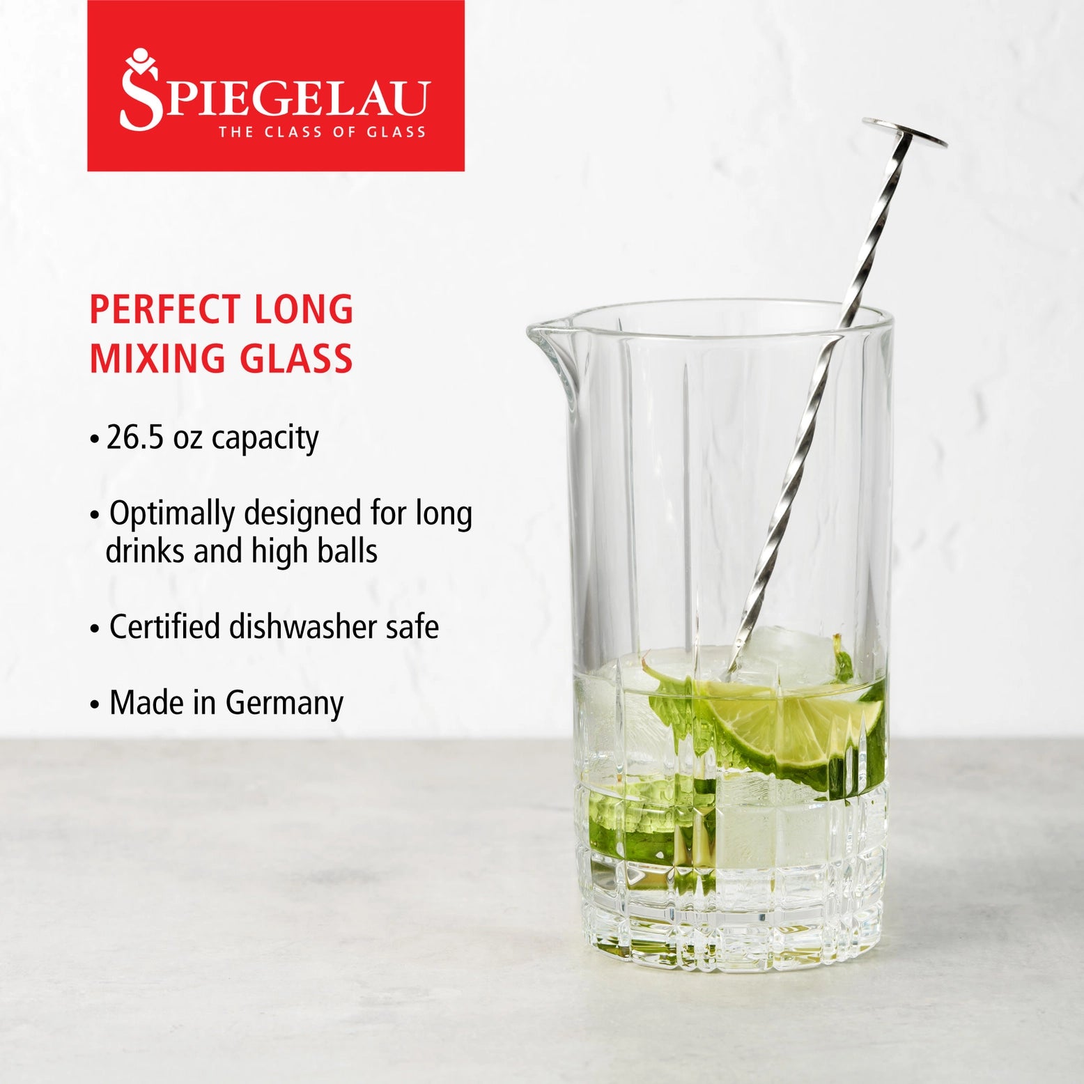 Spiegelau perfect long mixing glass with lime and ice on a white background