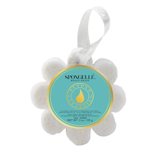 spongelle daisy bath sponge with the words beach grass on the label