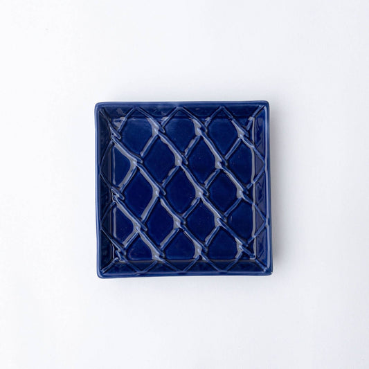 Navy blue square beverage napkin tray with lattice pattern