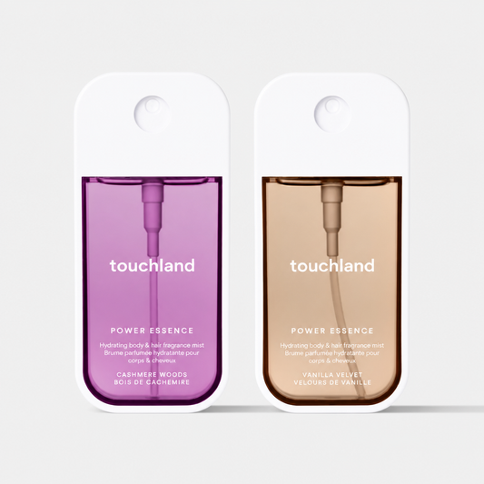 Two 'touchland' power essence products in purple and beige packaging on a white background