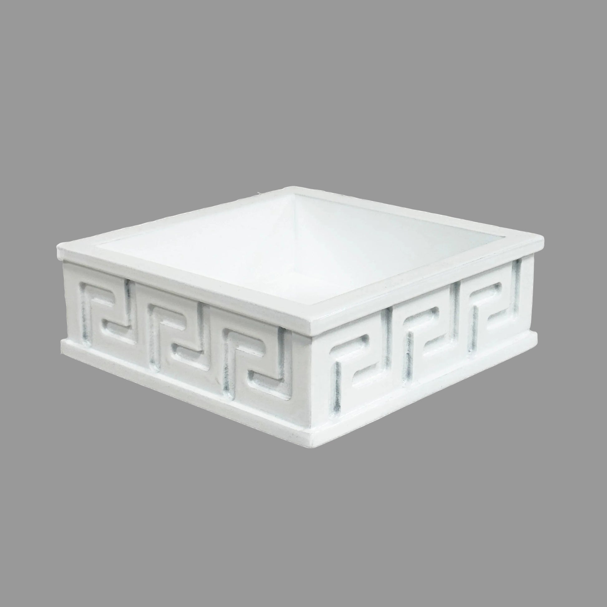 white cocktail napkin holder with a Greek key design