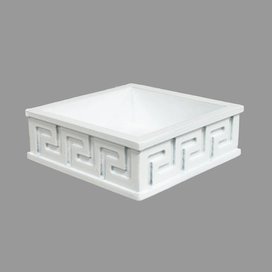 white cocktail napkin holder with a Greek key design
