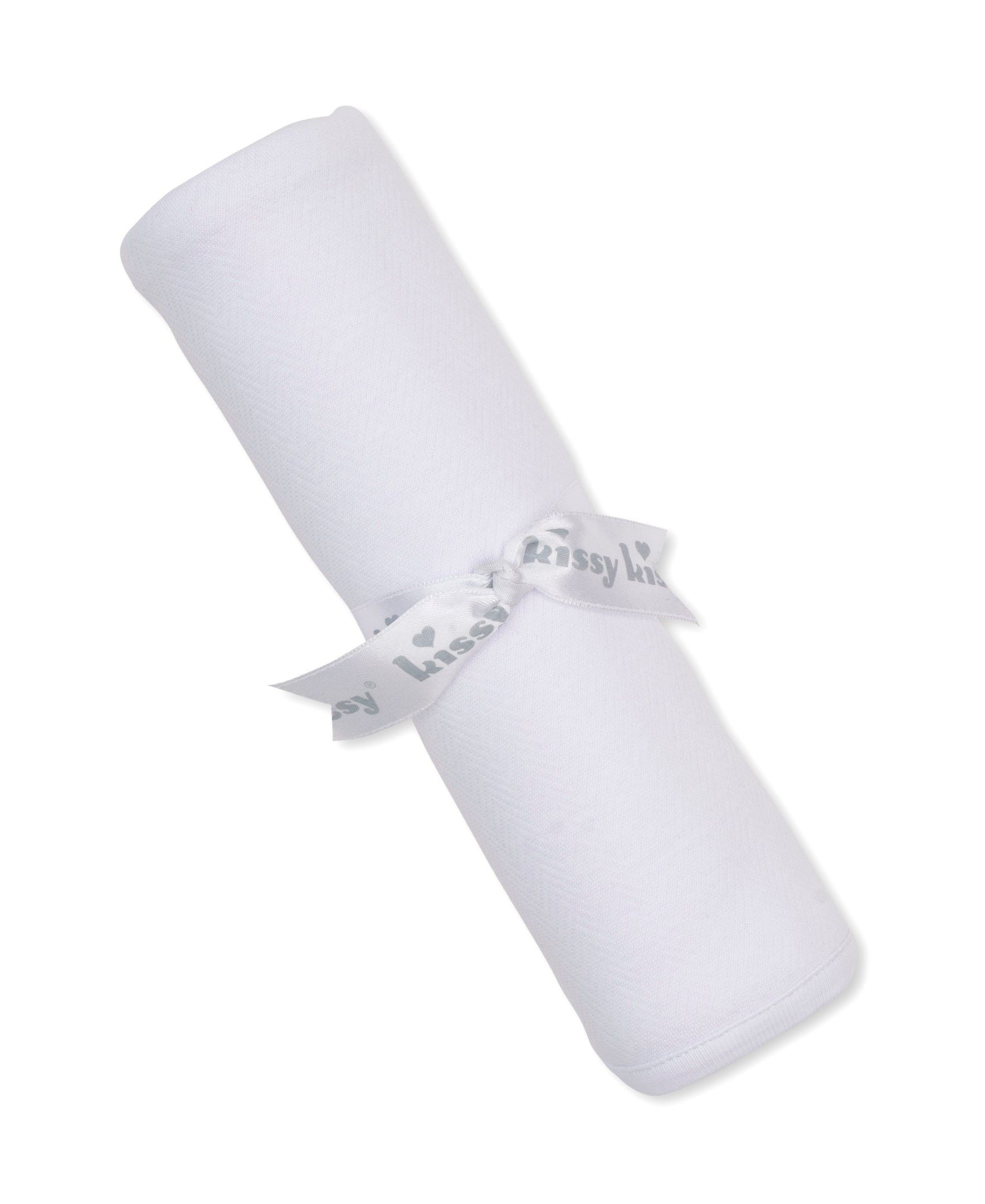 white jacquard baby blanket with a kissy kissy ribbon tying it together