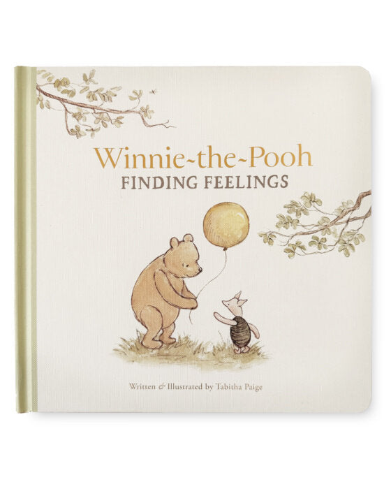 A Winnie the Pooh Finding Feelings board book with an illustration of pooh and piglet