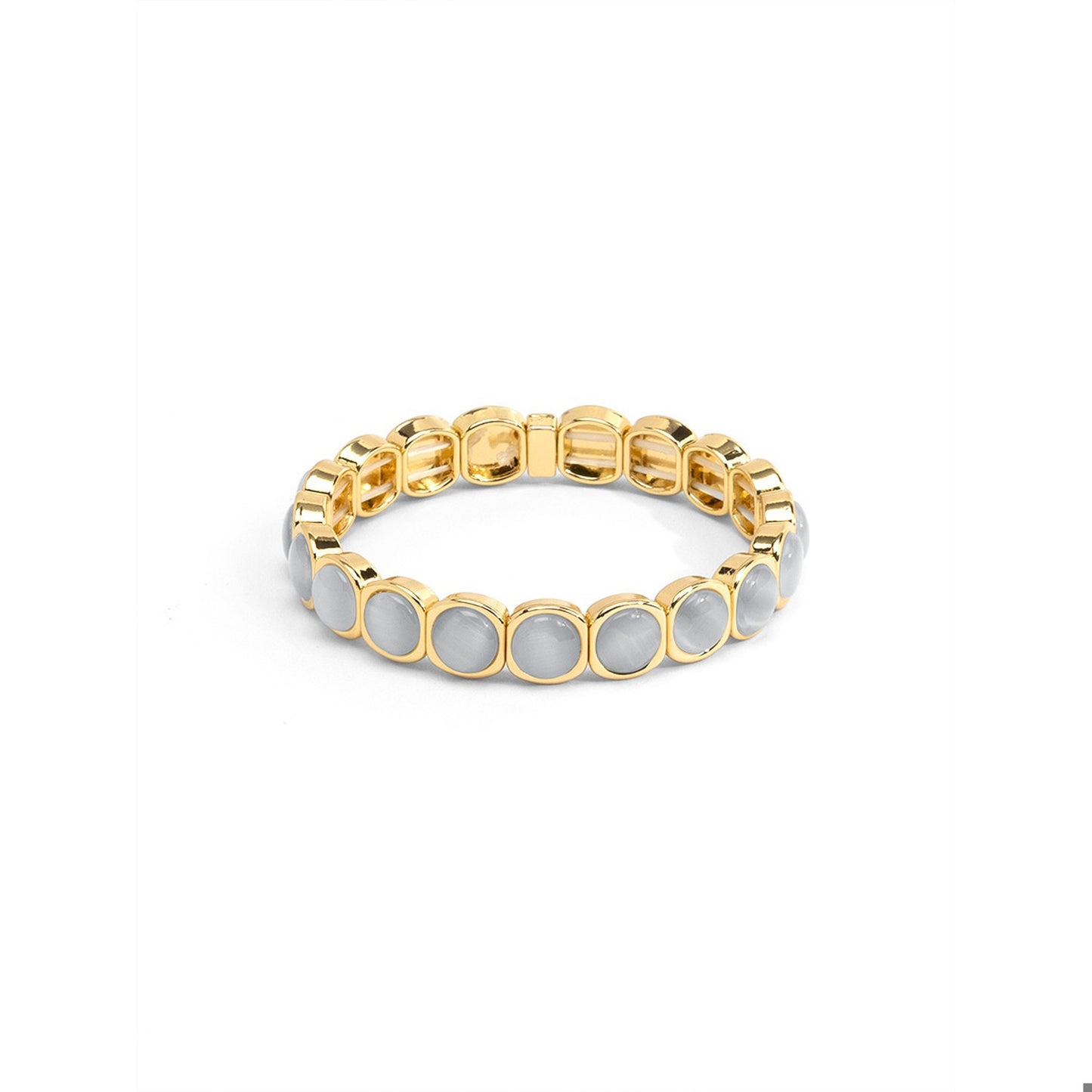 A gold-plated stretch band bracelet featuring round, light gray inlay stones.