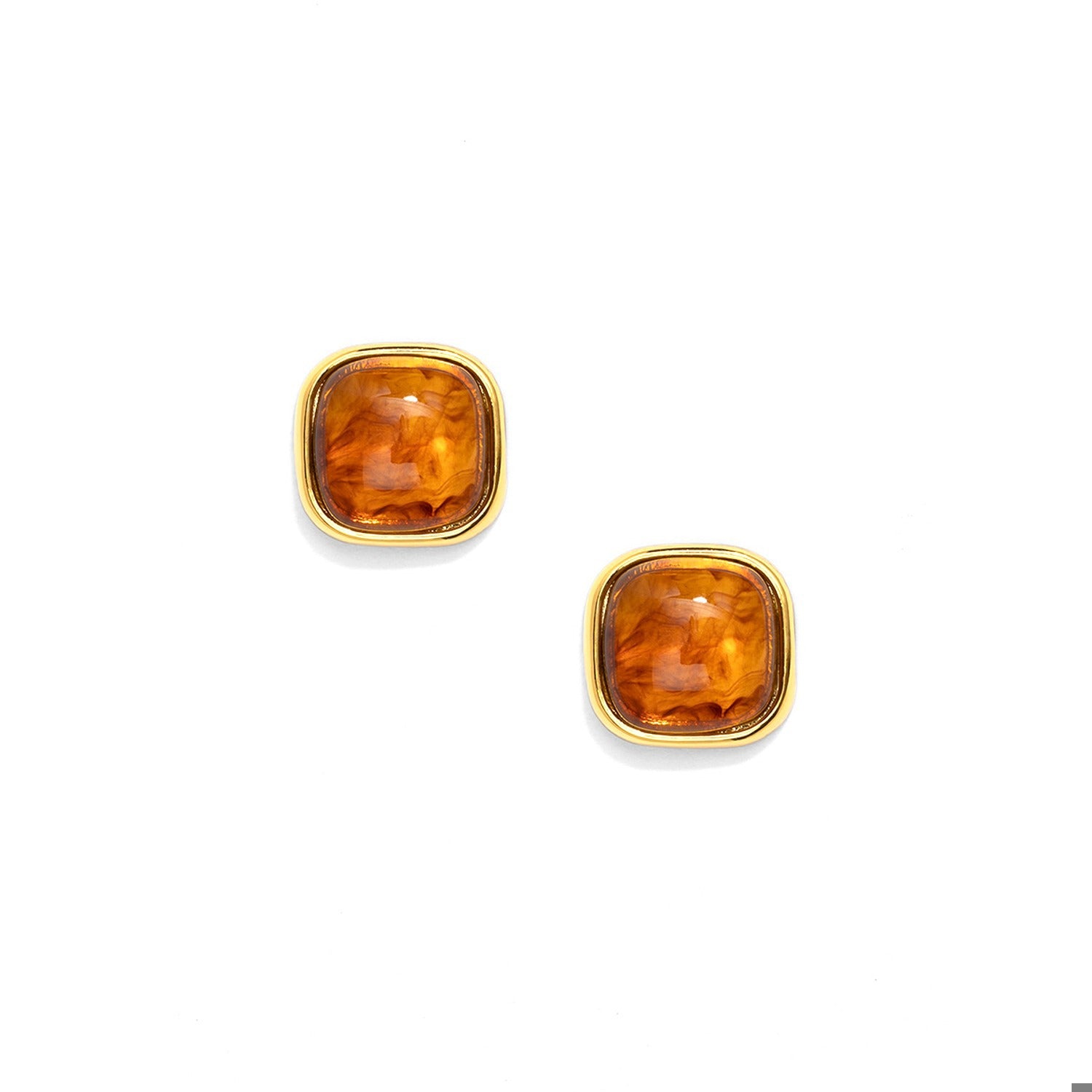 A pair of gold stud earrings with square cushion-cut amber-orange gemstones.